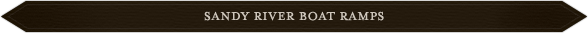 A brown sign with white letters that say " baker boys ".