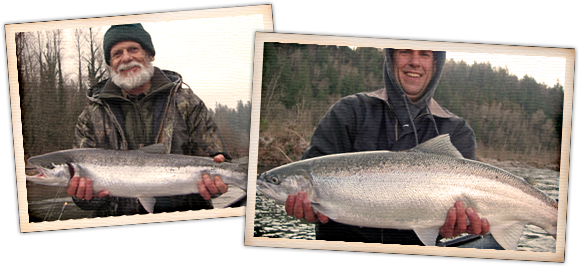 A man holding a large fish while standing in the water.