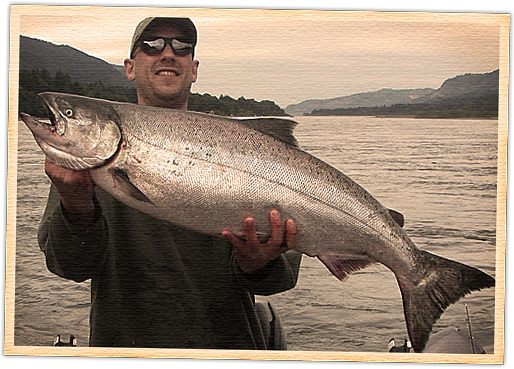 A man holding a large fish in his hands.