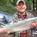 A man holding a fish in his hands.