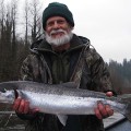 A man holding a fish in his hands.